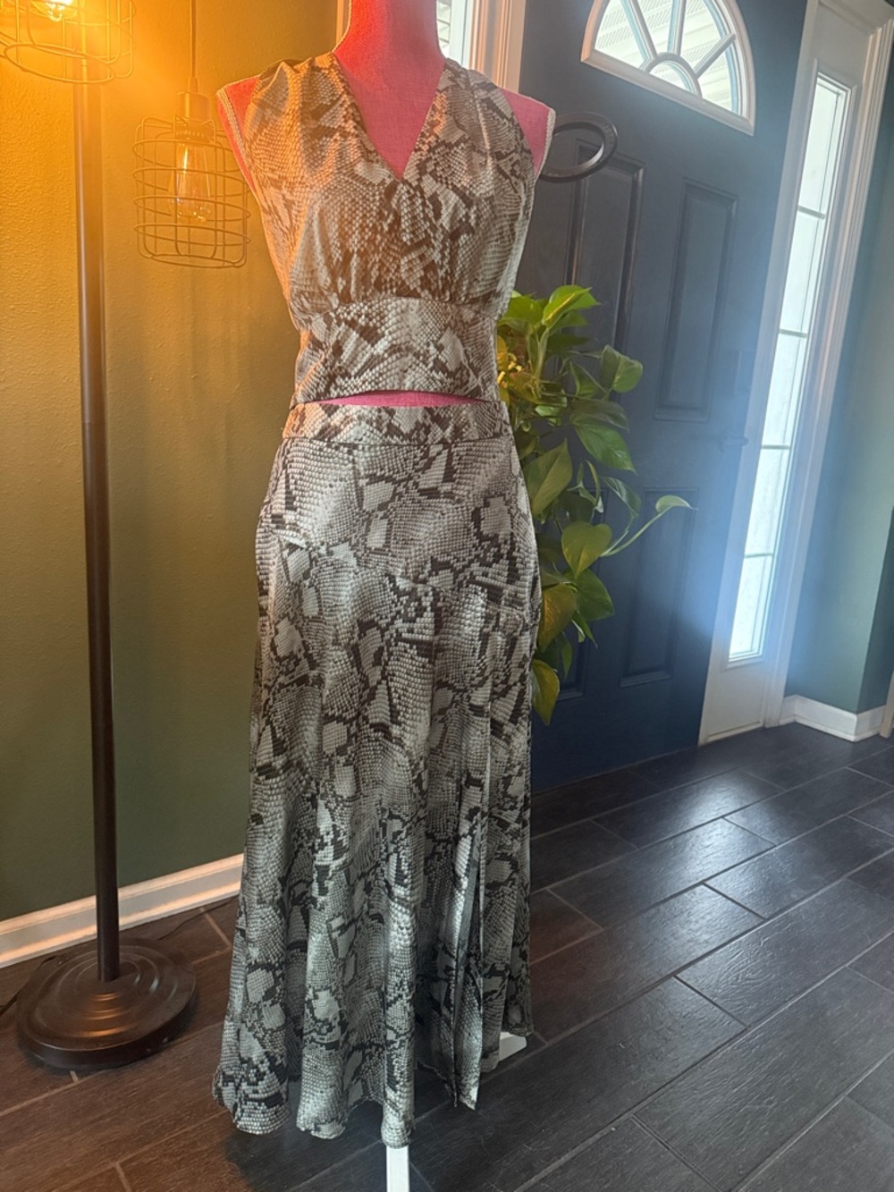 Two piece set with skirt and halter top. Skirt size 6, top size 10